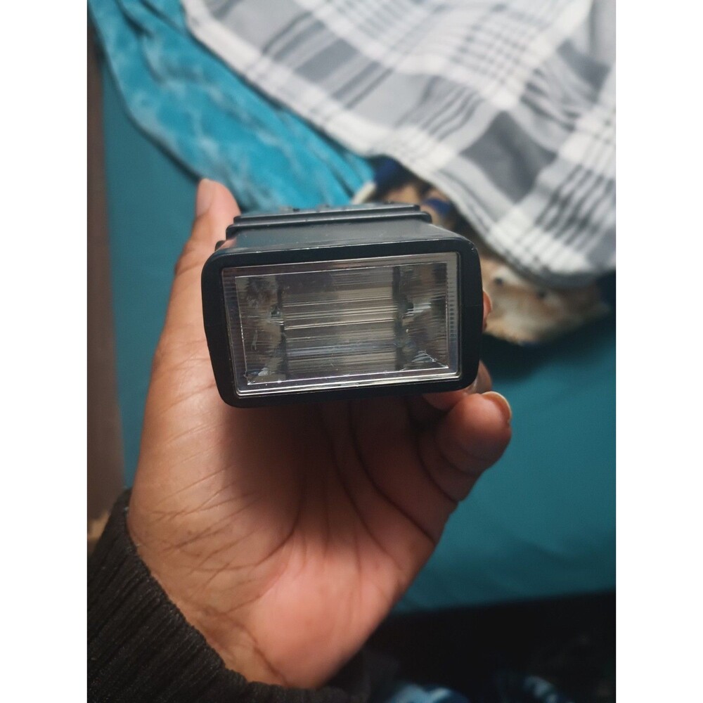 Sunpak auto 144 flash for  film SLR cameras